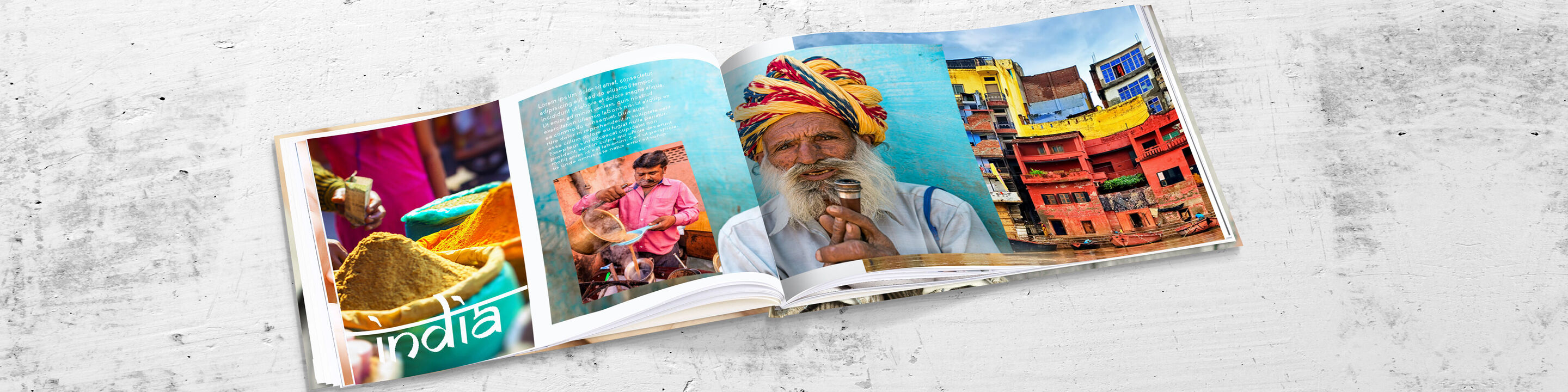 CEWE FOTOBUCH abierto con imágenes coloridas de India y diseños creativos.