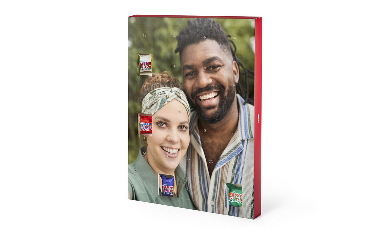 CEWE FOTOLIBRO con aperitivos coloridos y un fondo agradable.