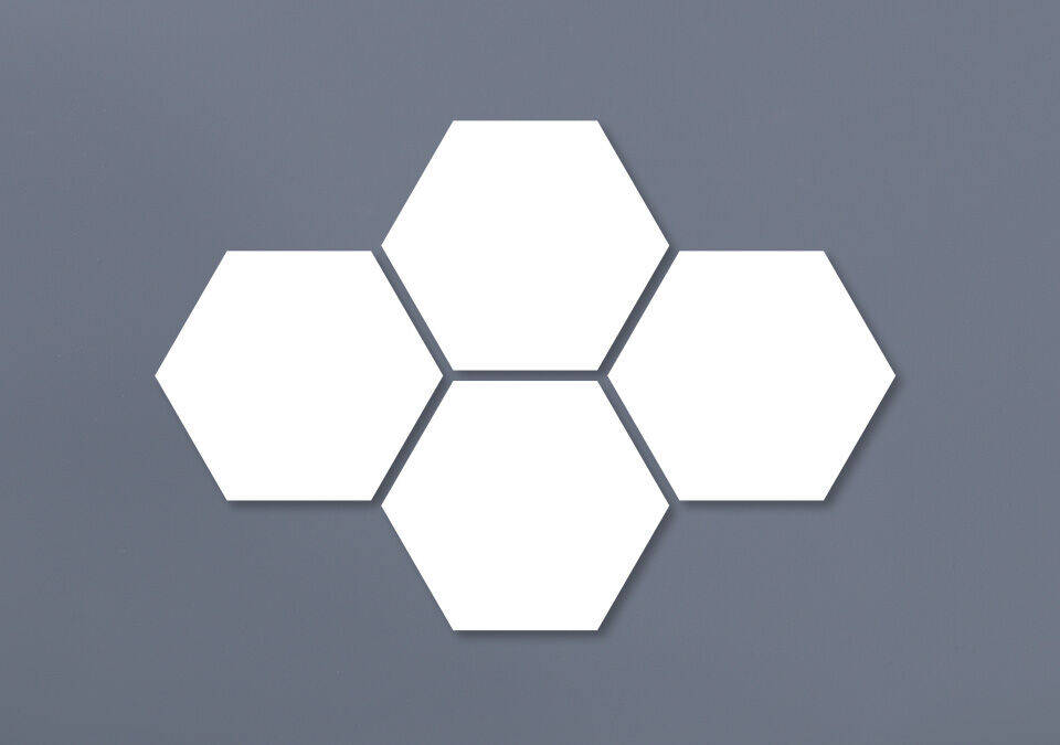 Formas hexagonales vacías sobre fondo gris
