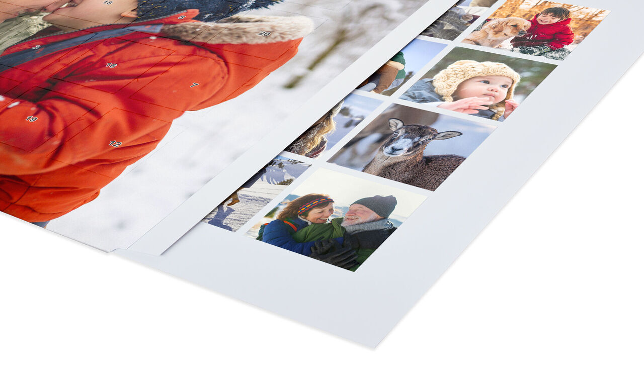 Un fotolibro abierto con recuerdos invernales que muestra a una familia en la naturaleza.