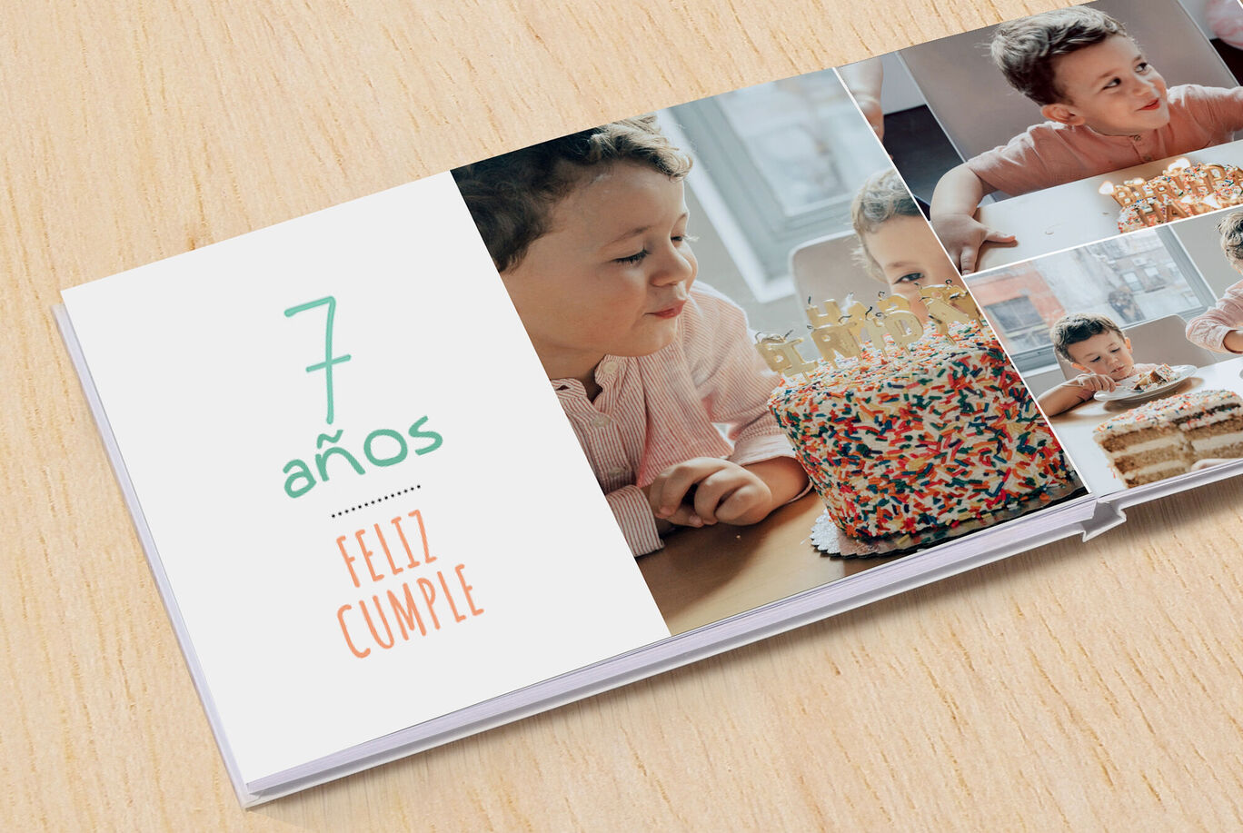 Un CEWE FOTOLIBRO con coloridas fotos de un cumpleaños con un pastel y niños felices.