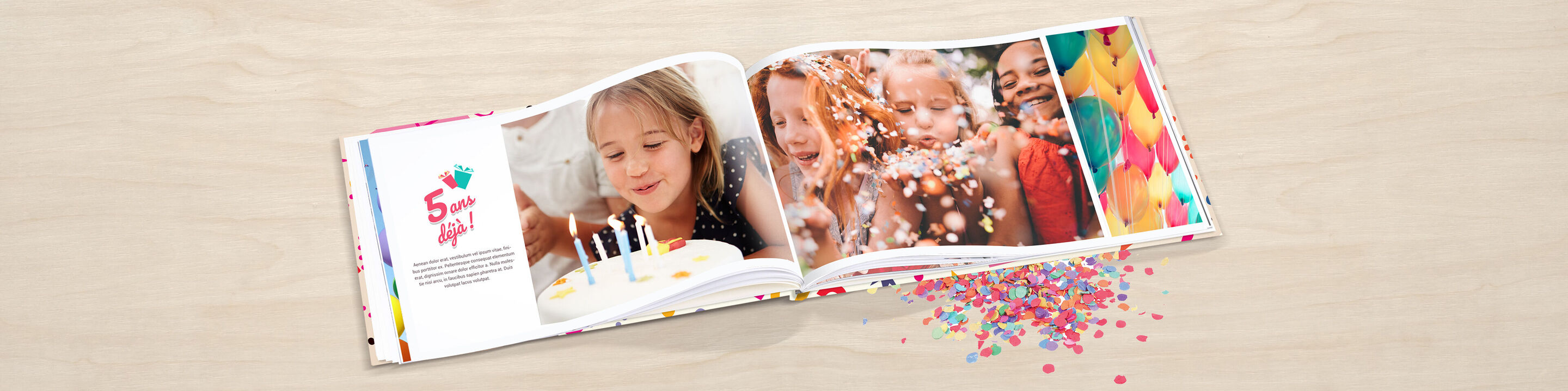 Un fotolibro abierto muestra niños felices en un cumpleaños con confeti y un pastel.
